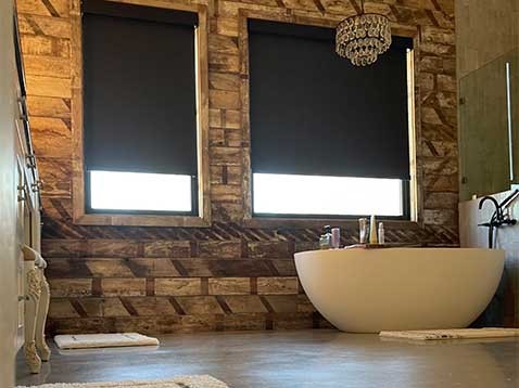 Eclectic bathroom with chandelier